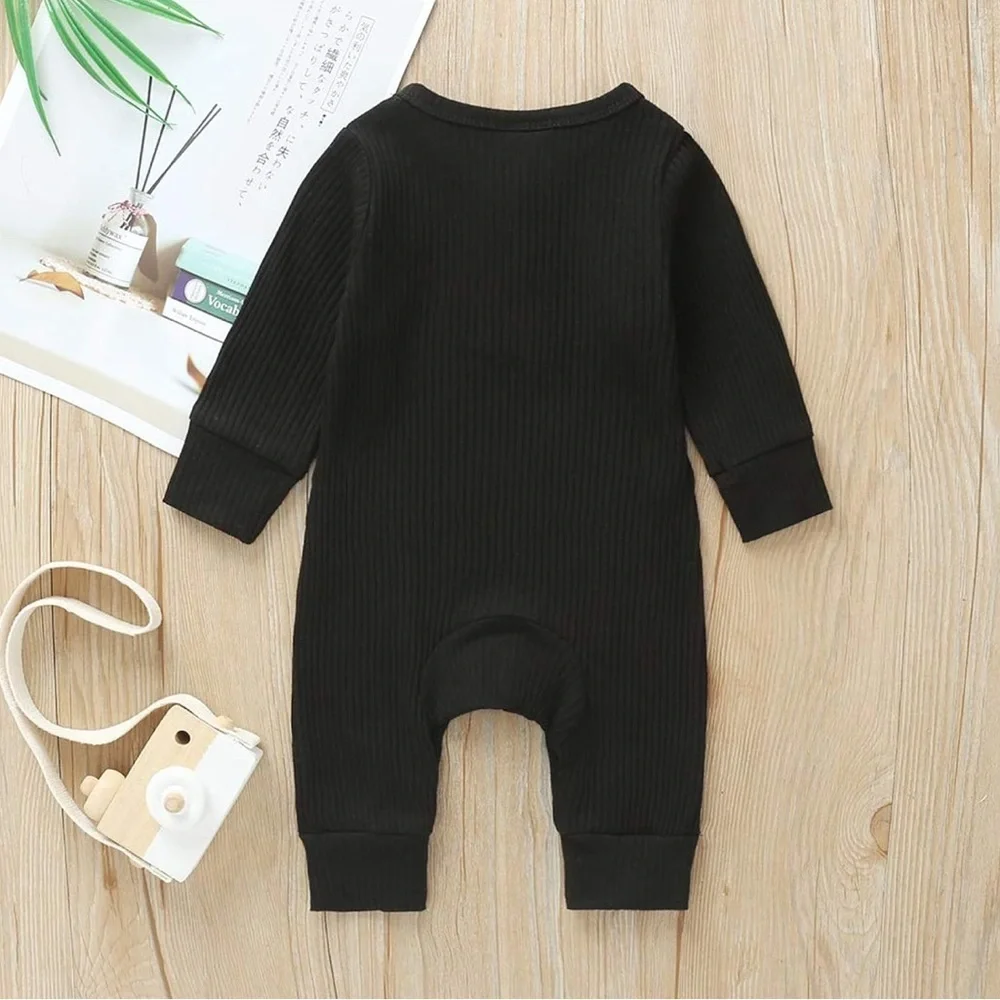 Baby Romper in Black with Henley Button Detail - Picture 2 of 5